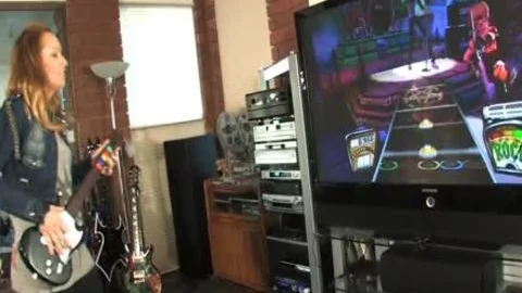 Khloe Hart Playing Guitar Hero