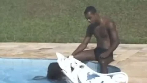 Fabiola With Andre Garcia Near The Pool