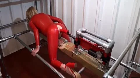 RachelSexyMaid 34 Dungeon Fuckmachine In Red Latex Catsuit
